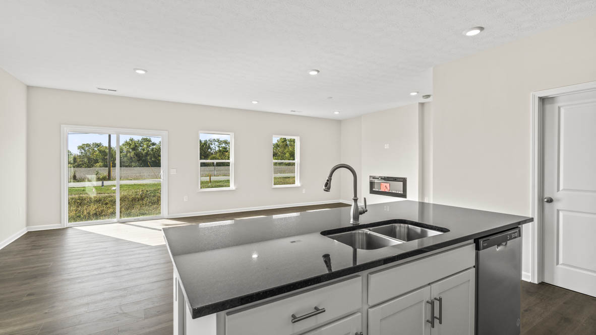 View from the sink of the great room and sliding door.