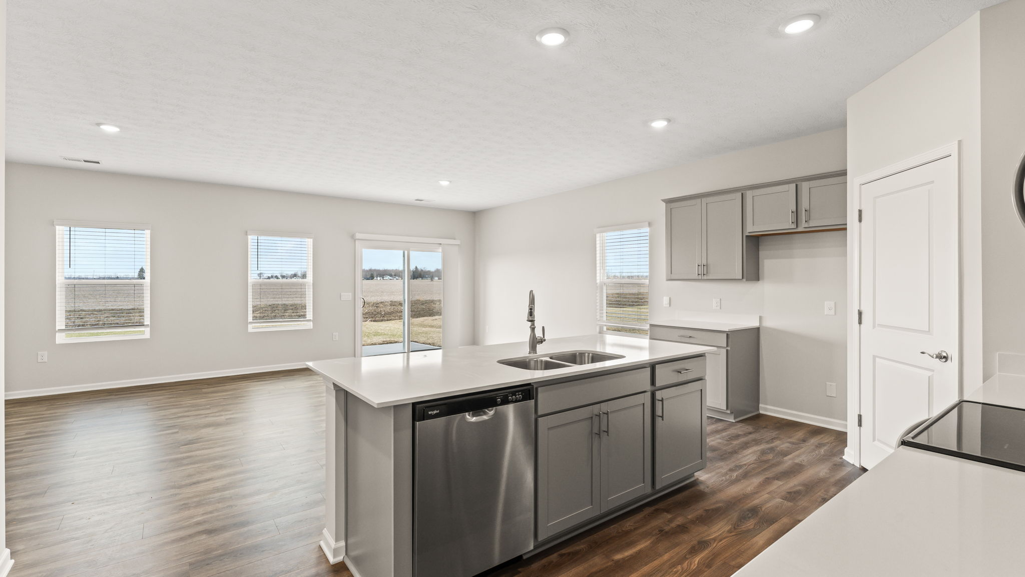 Great area from the kitchen including island with dishwasher.