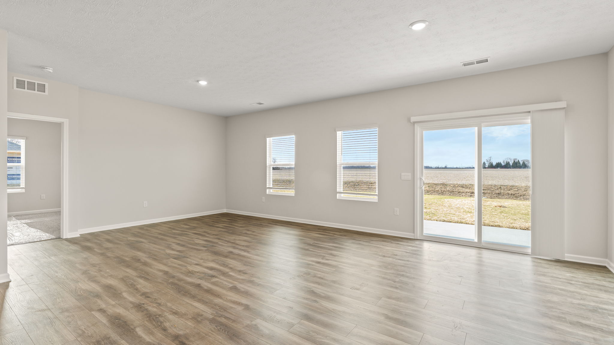 Full great/living area with sliding door to outside.