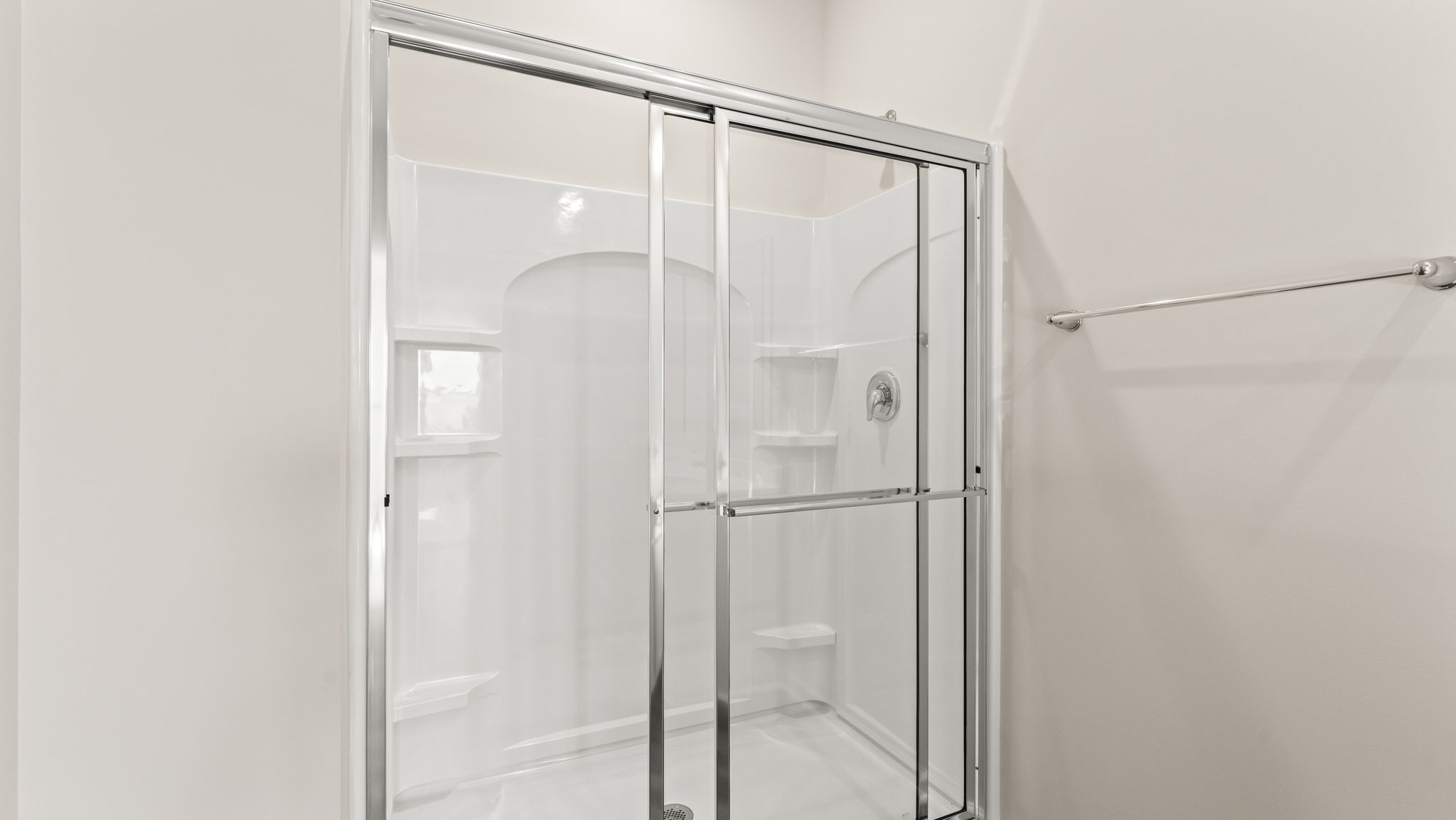 Closeup of walk-in shower.