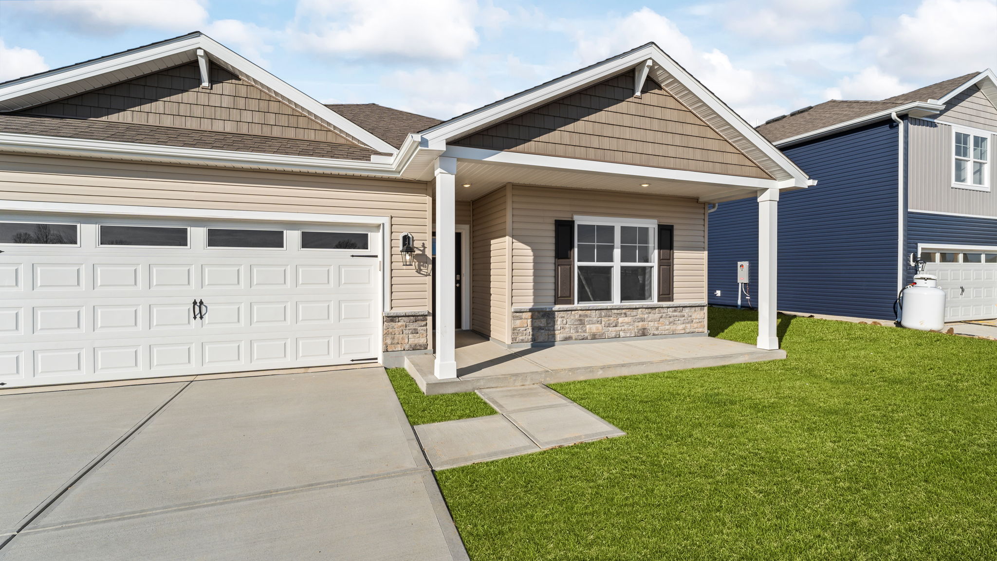 closeup and front porch of 2912 hoying dr