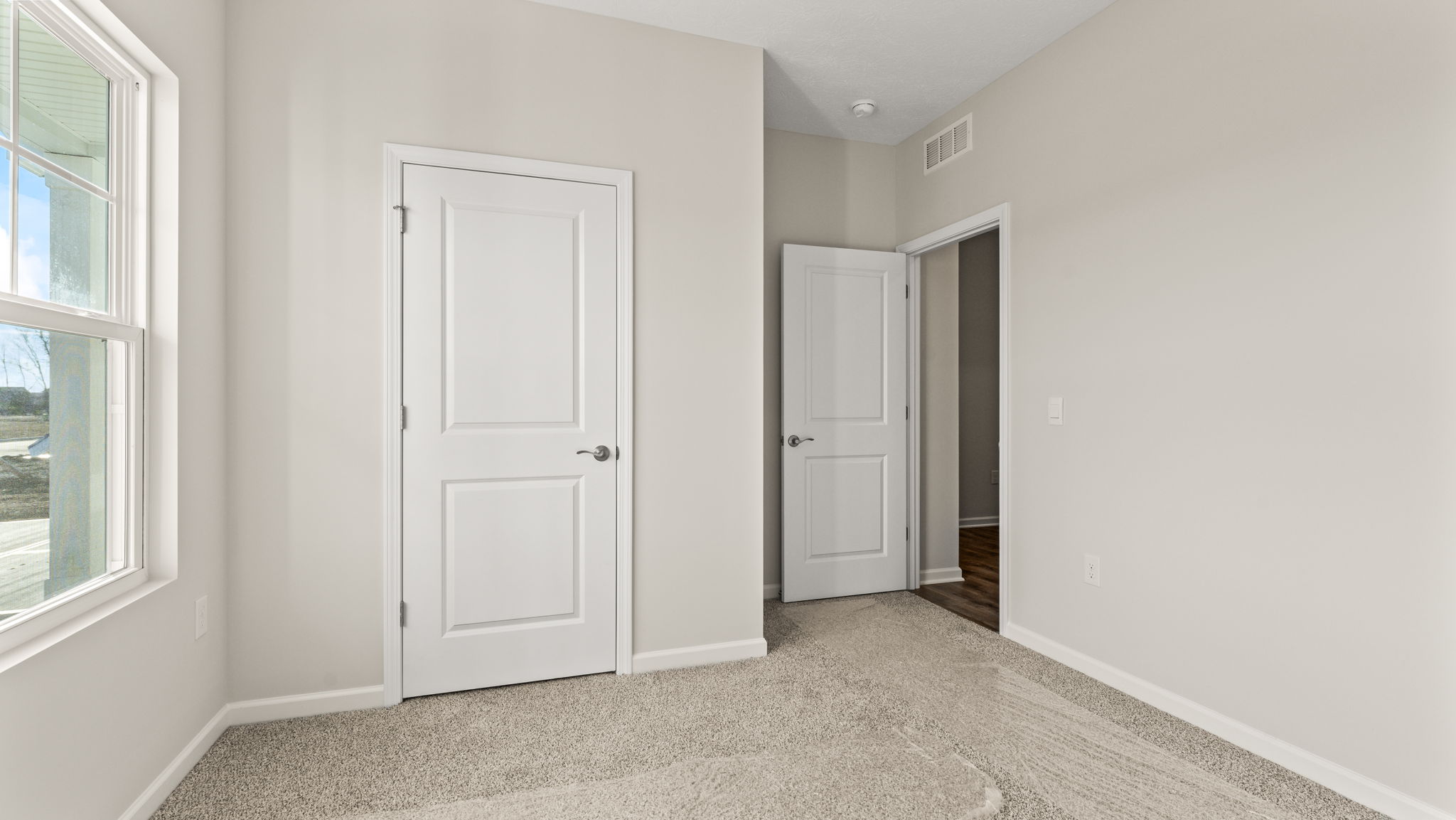Bedroom looking into hallway