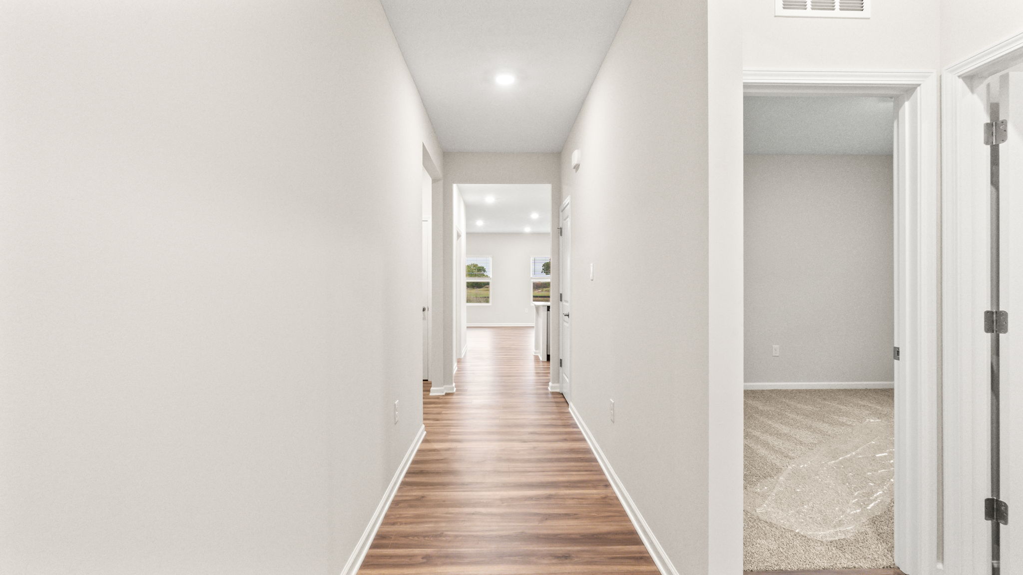 Hallway leading towards great room