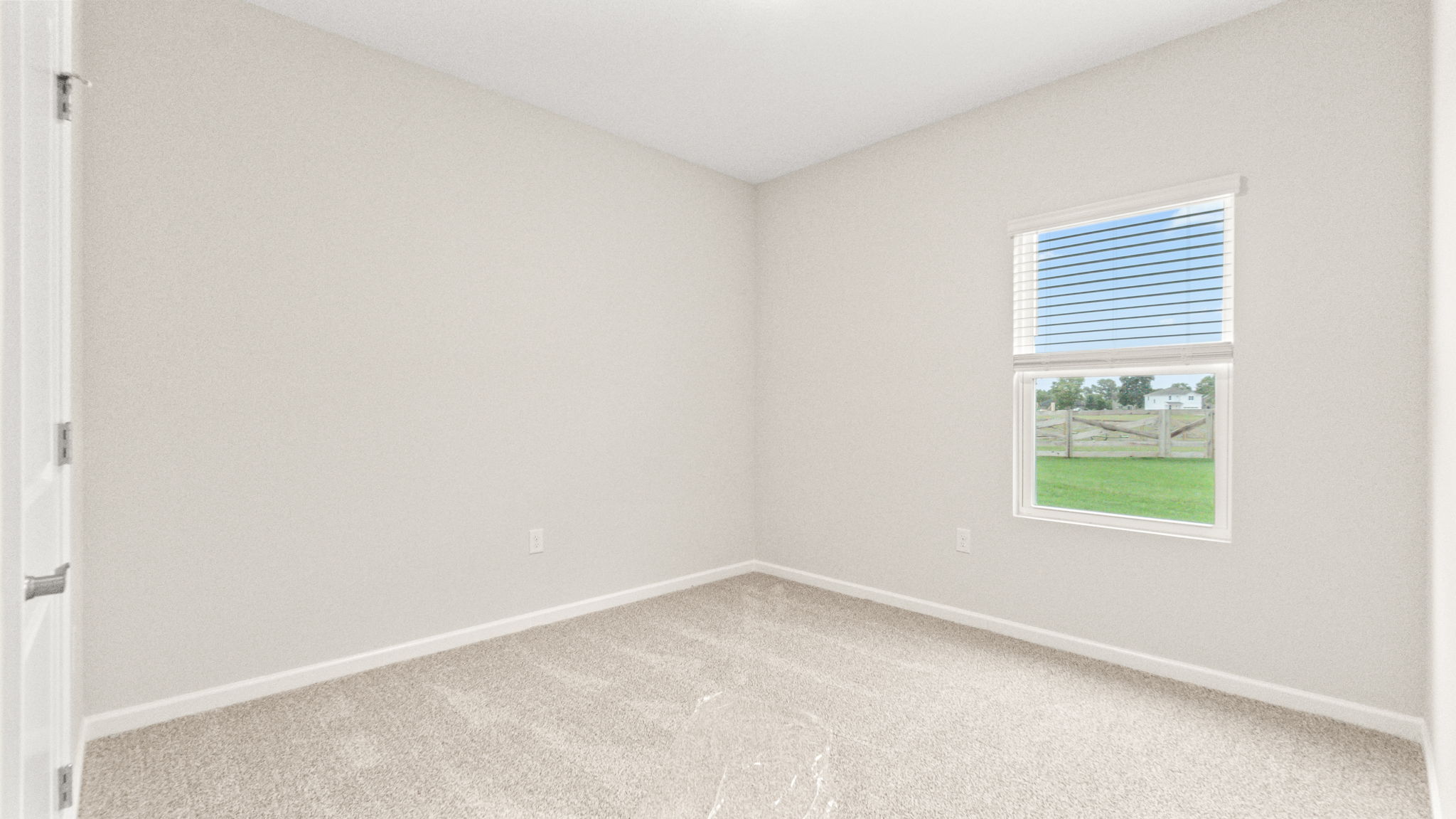 carpeted bedroom with window
