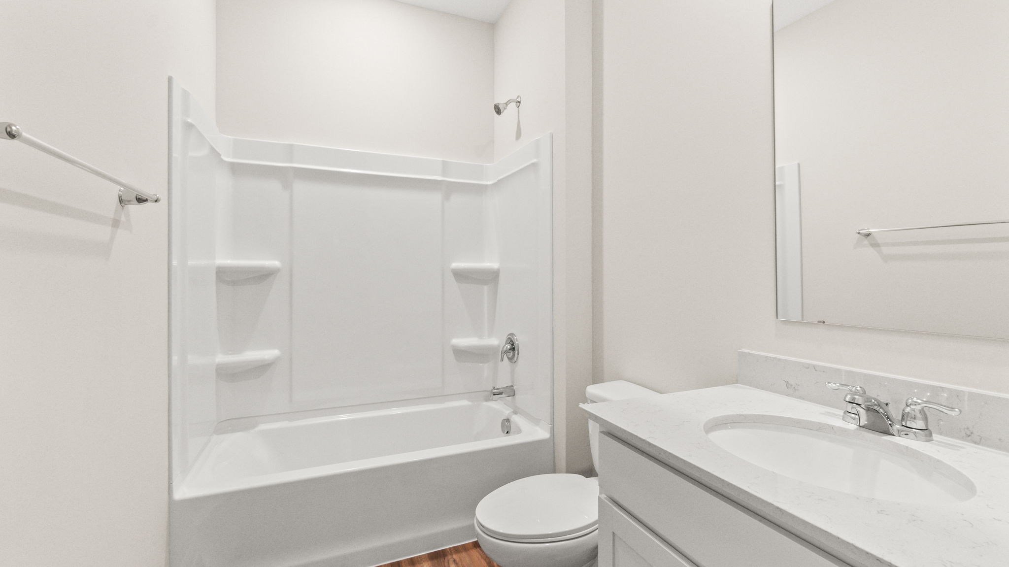 Bathroom with tub, toilet, and sink