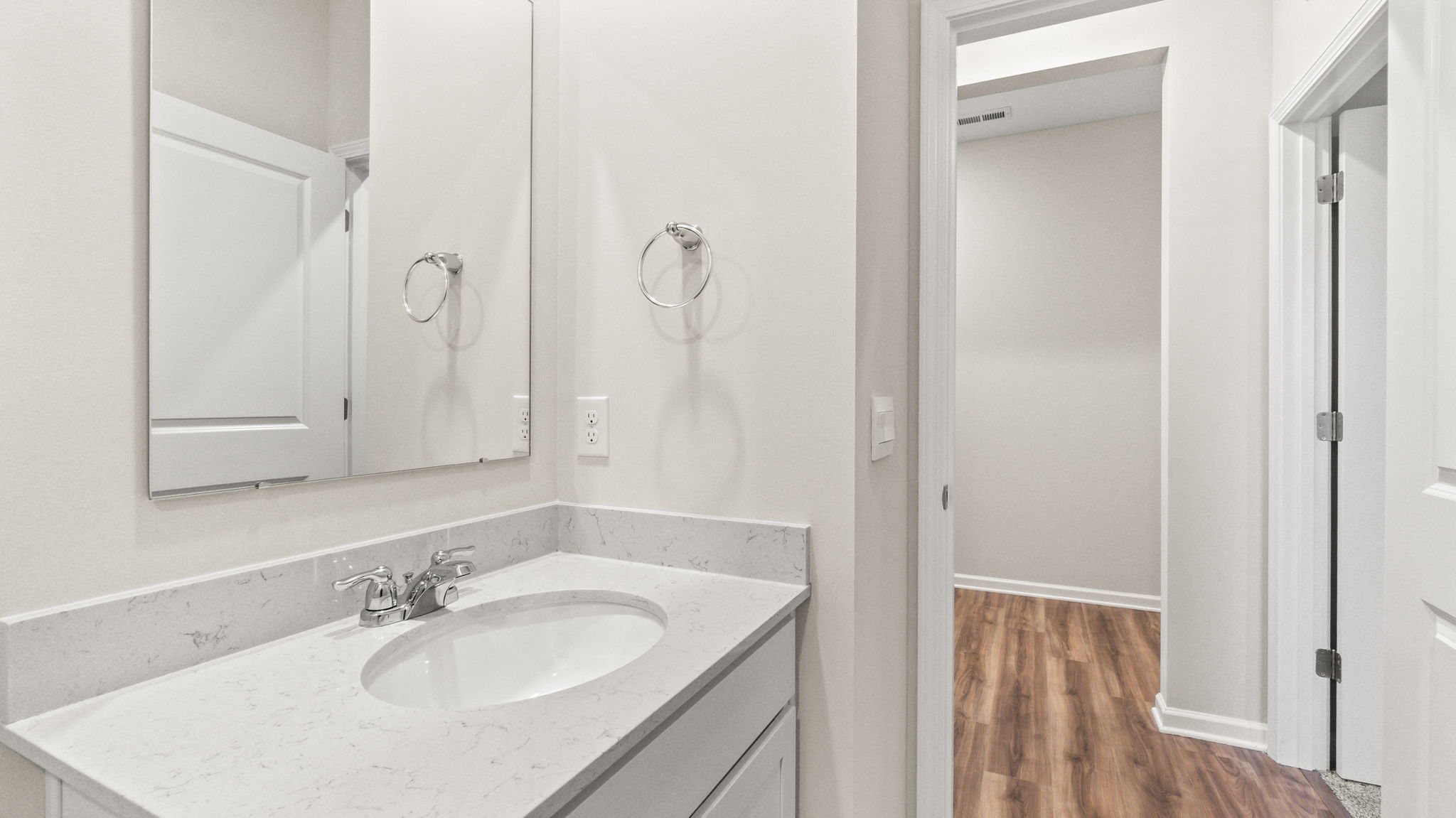 closeup of bathroom sink and mirror