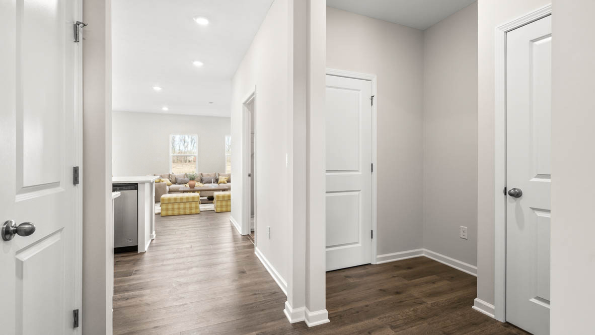 Hallway at front of the home leading into great room.
