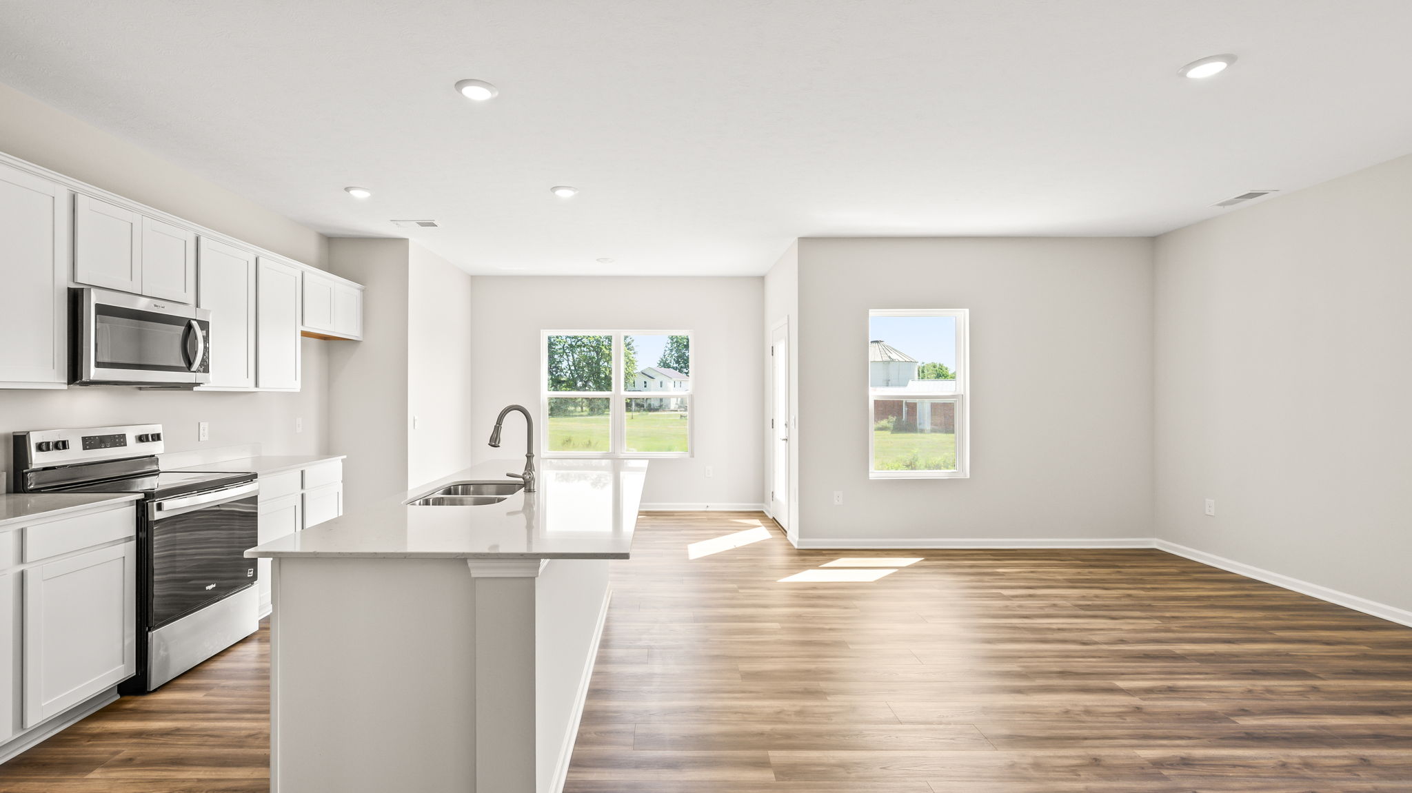 Side view of full kitchen and great room