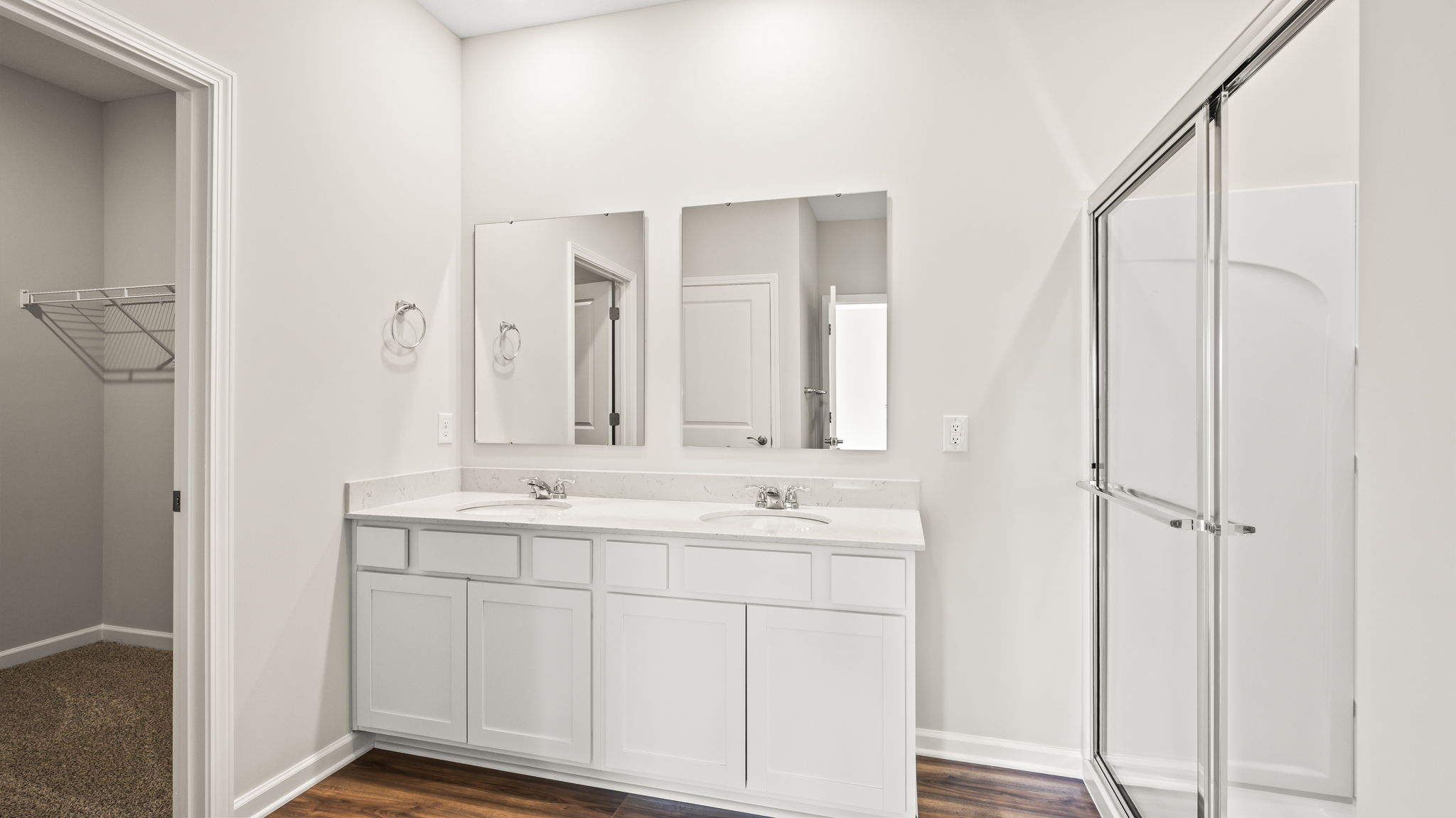 Wide of full primary bathroom suite