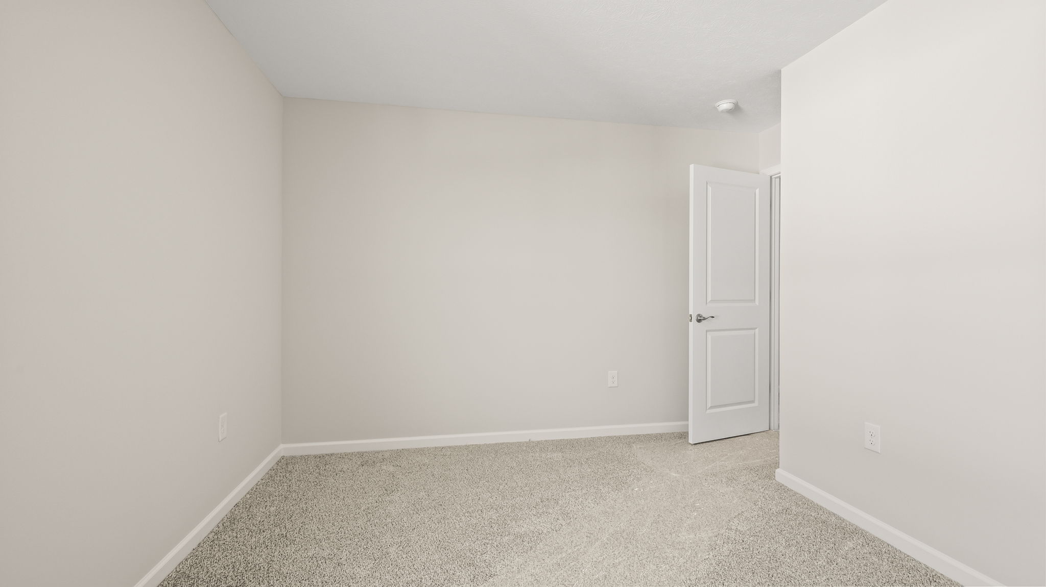 Carpeted bedroom