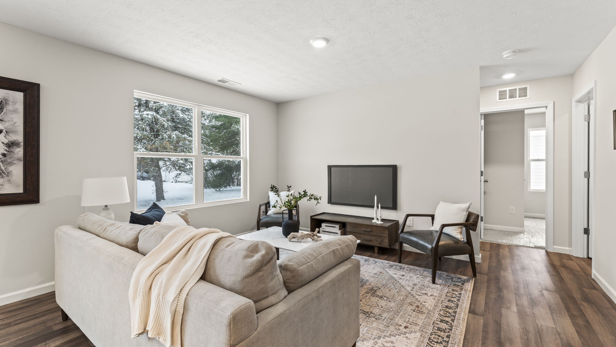 New home living room with modern design details and functional connectivity for daily flexibility