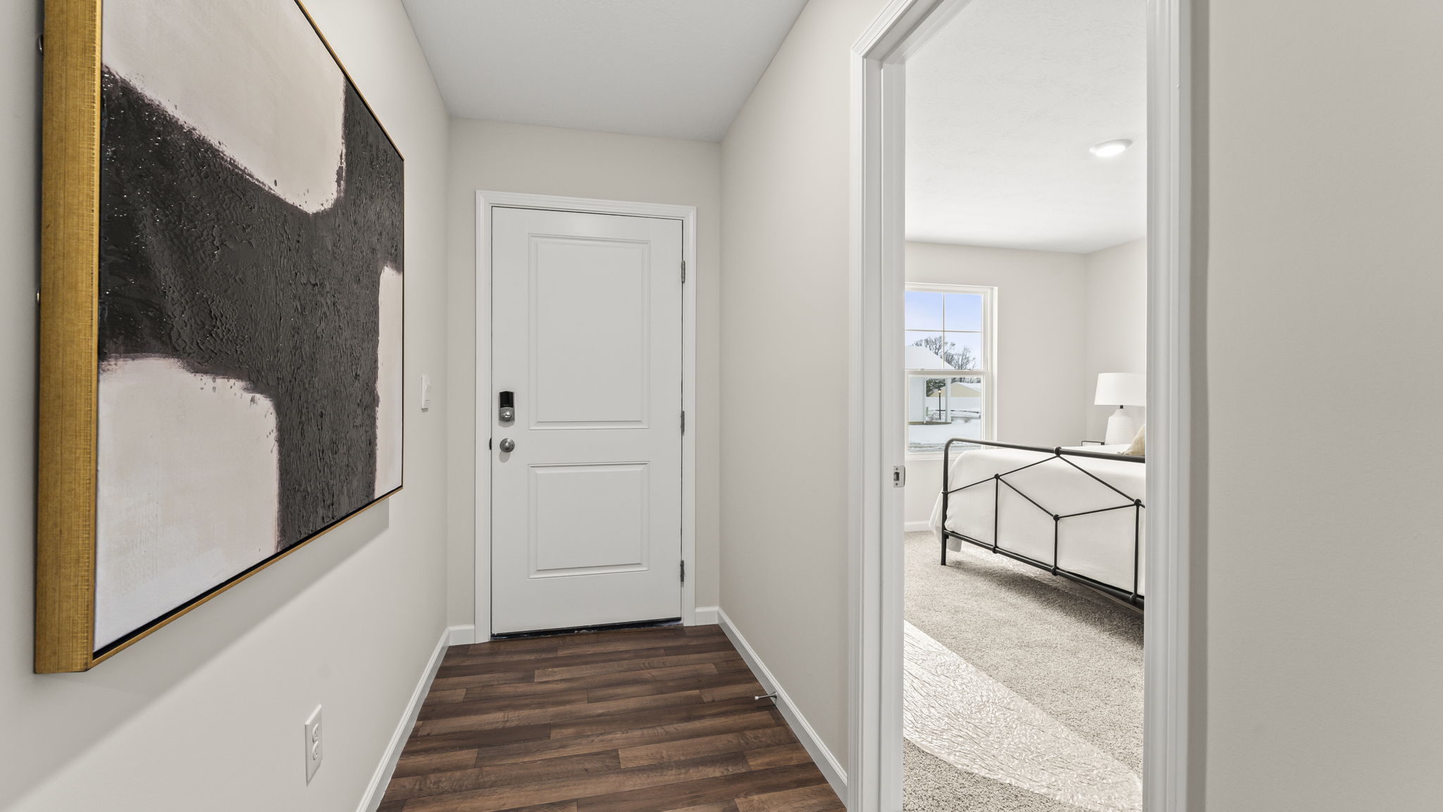 Front Door, primary bedroom, flex office, stairs, and access to this new residence bring you home to well-crafted and designed living