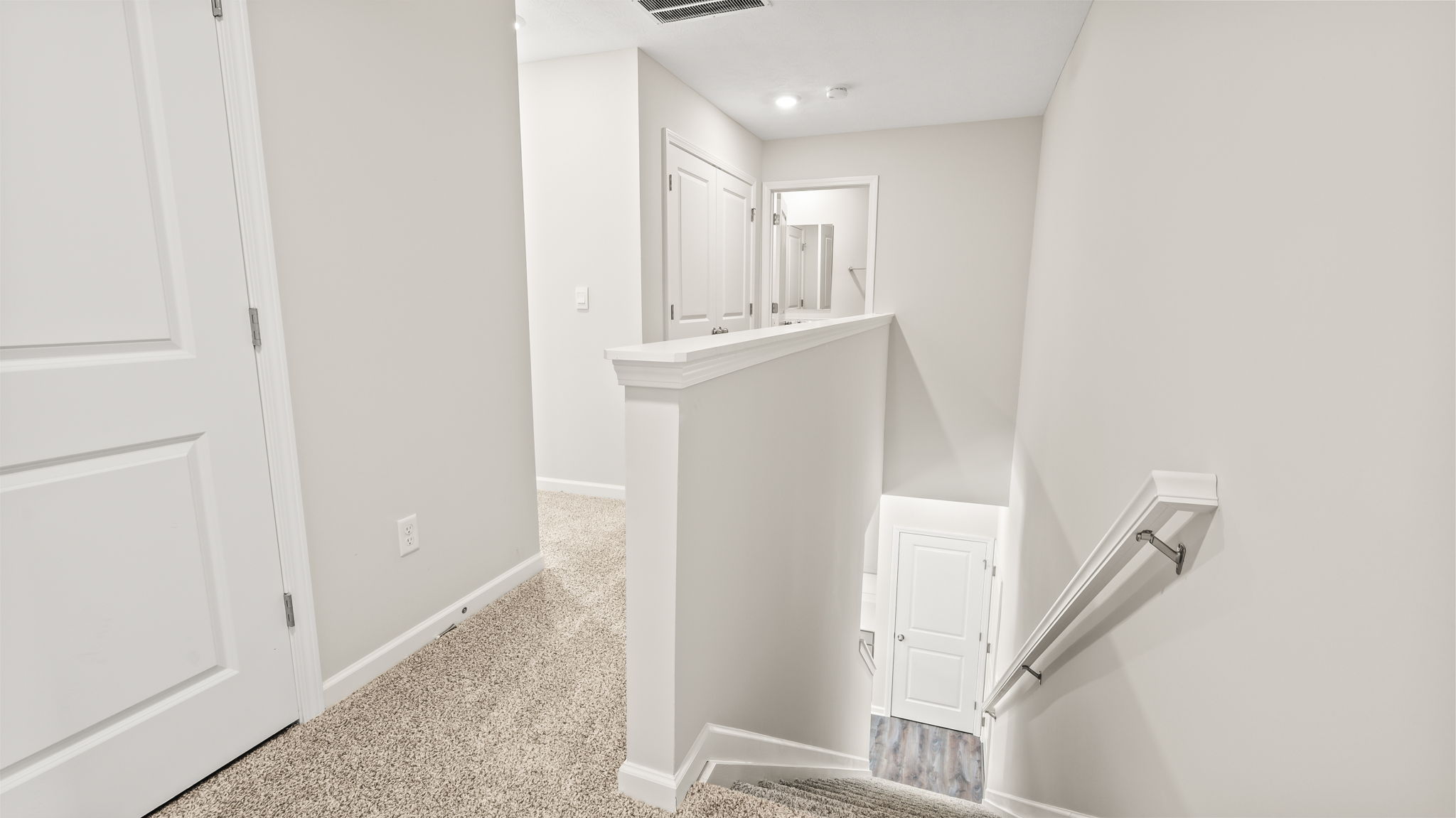 Upstairs landing with view down stairs