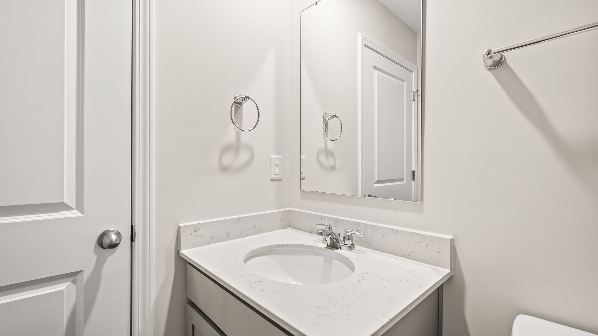 Closeup of sink with mirror