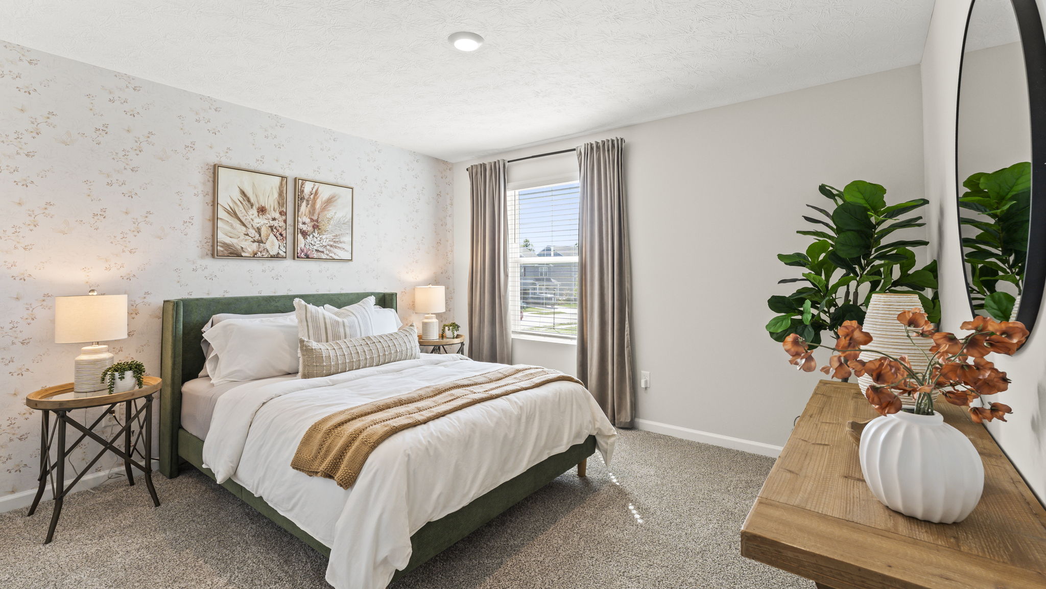 Quarter view of full bedroom with earthy tones