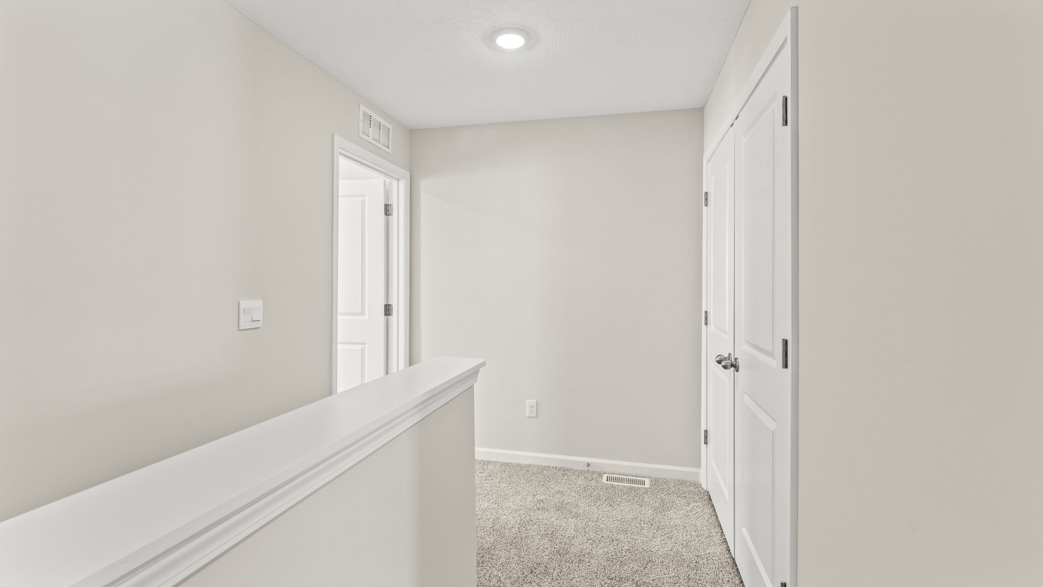Upstairs landing into bedroom