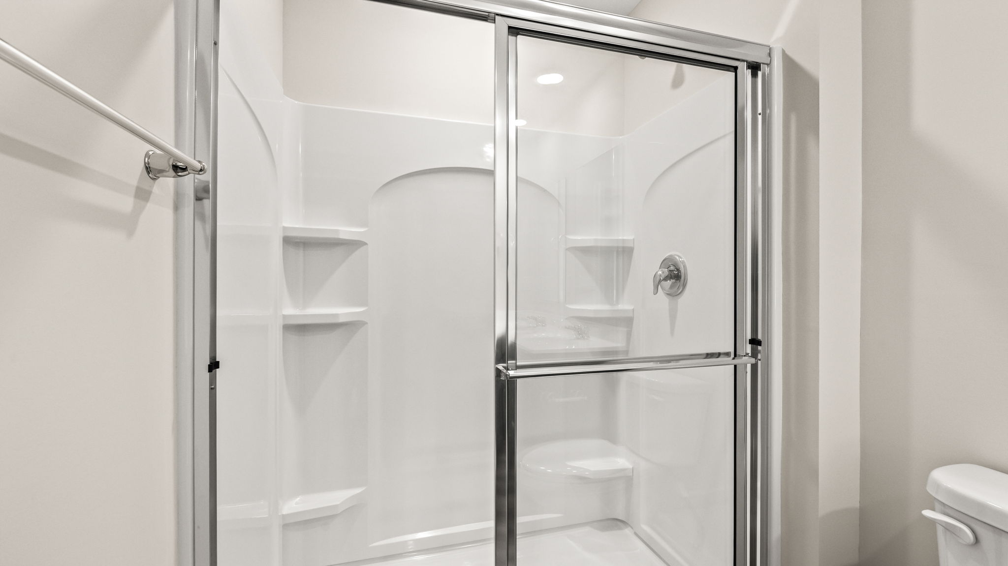 Closeup of glass door shower