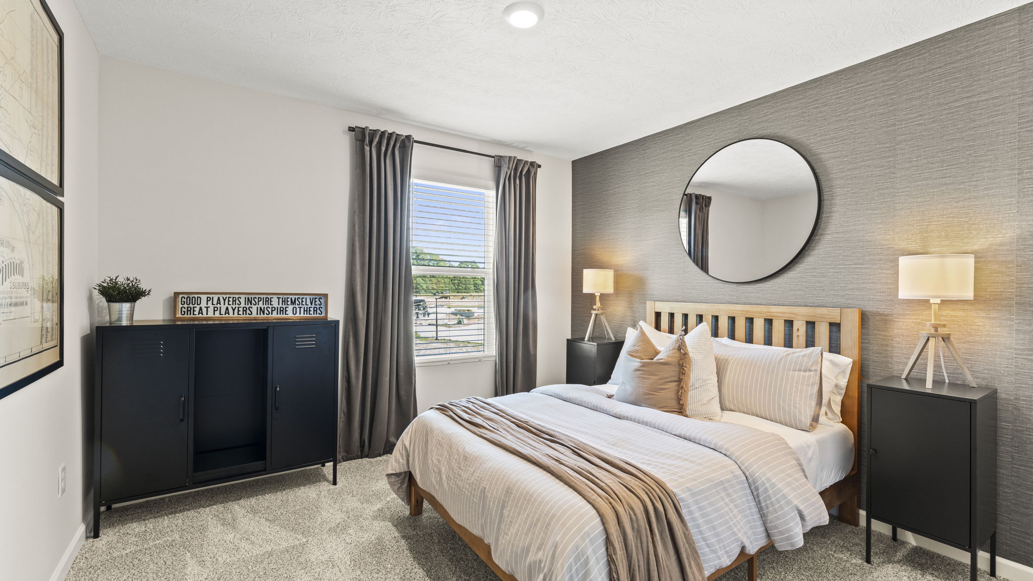 Bedroom with subtle sports-themed decorations and cabinets