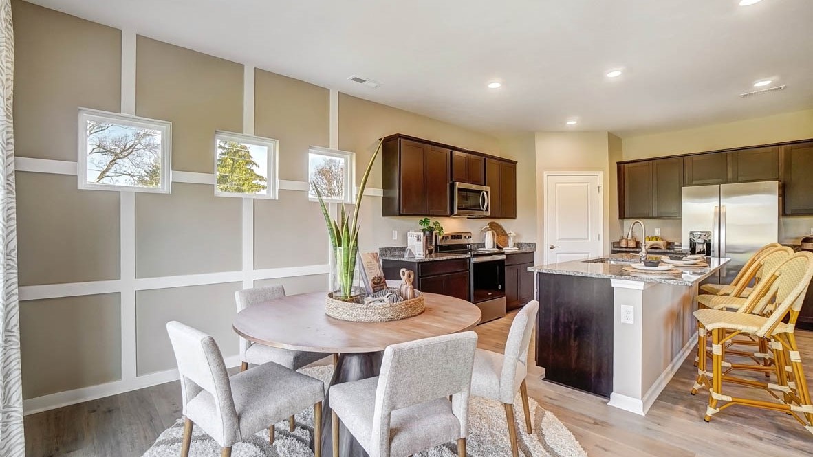 open concept dining and kitchen flow together