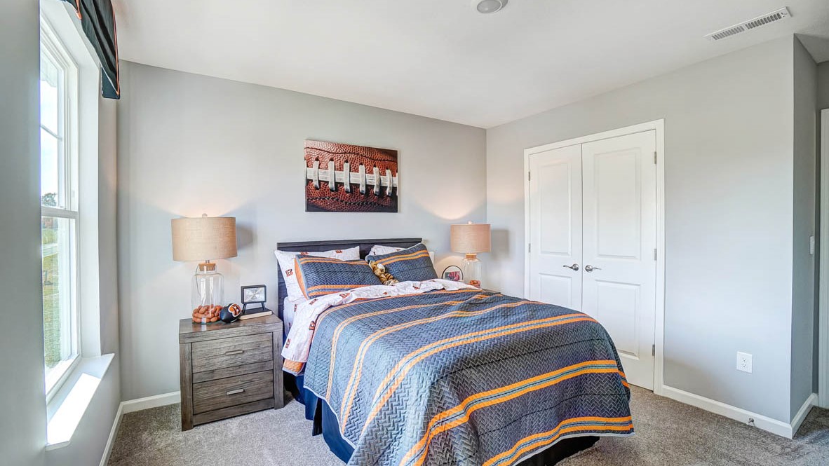 bengals themed room and bedside tables and closets.