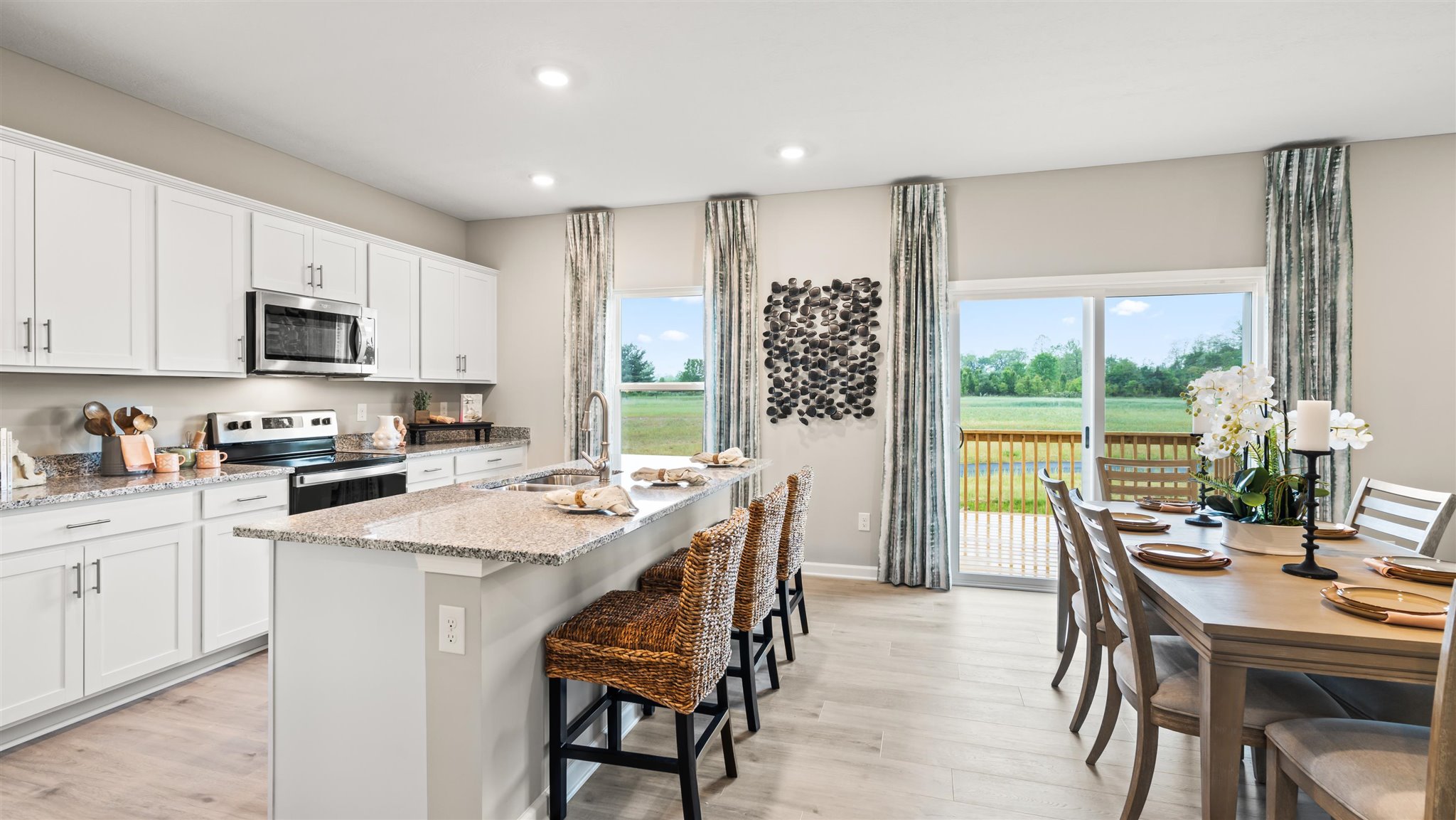 View of both kitchen and casual dining area.