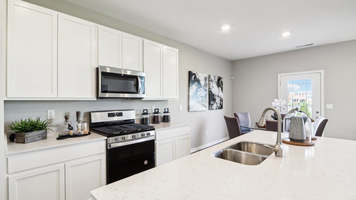 Three-quarter perspective of kitchen.