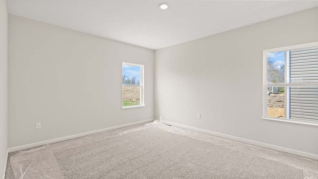 Bedroom with two windows