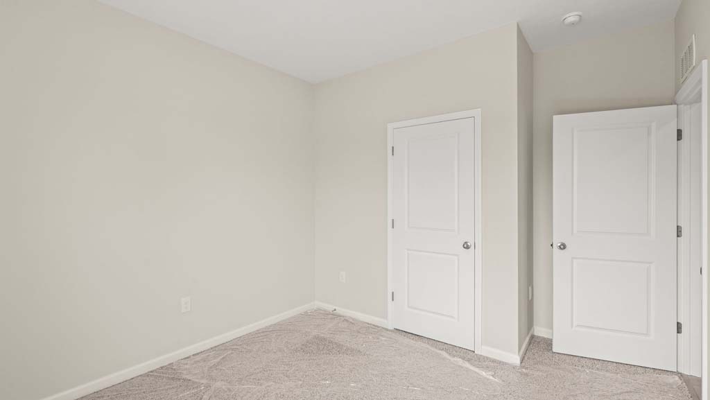 Bedroom with closet door
