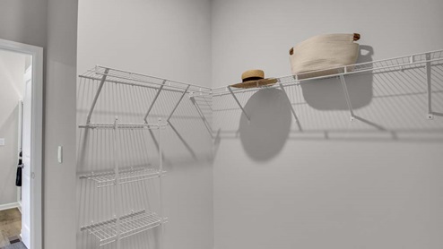 walk-in closet and ample storage.
