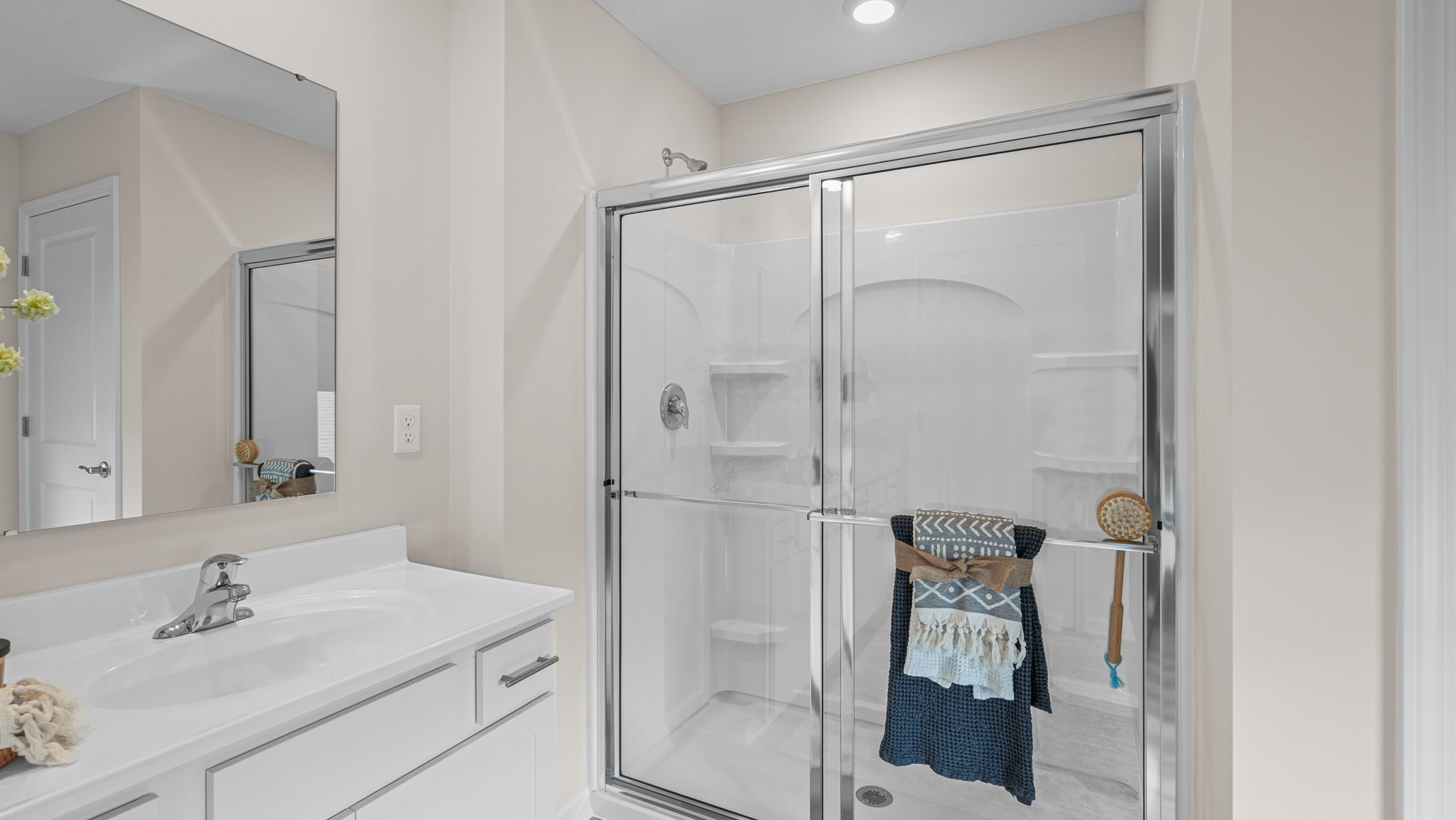 Primary bathroom with large walk in shower.