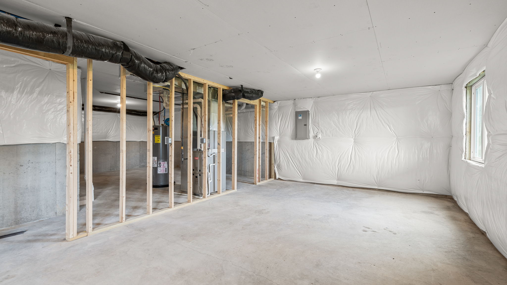 Basement area with concrete flooring.
