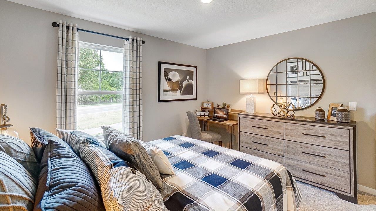 Bedroom with wooden décor and modern decorations.