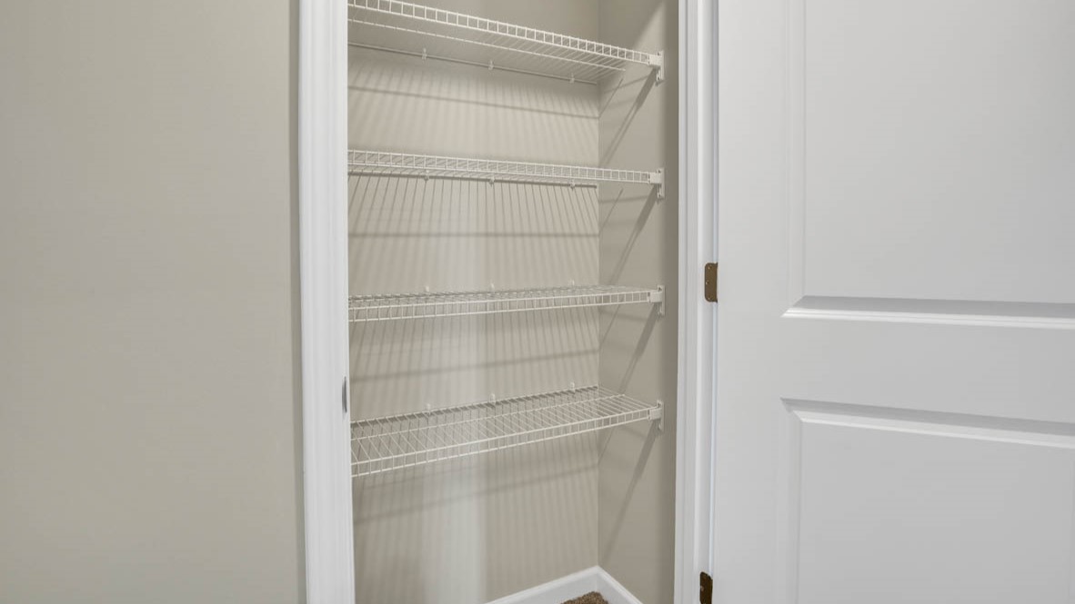 Hallway closet with wire shelving