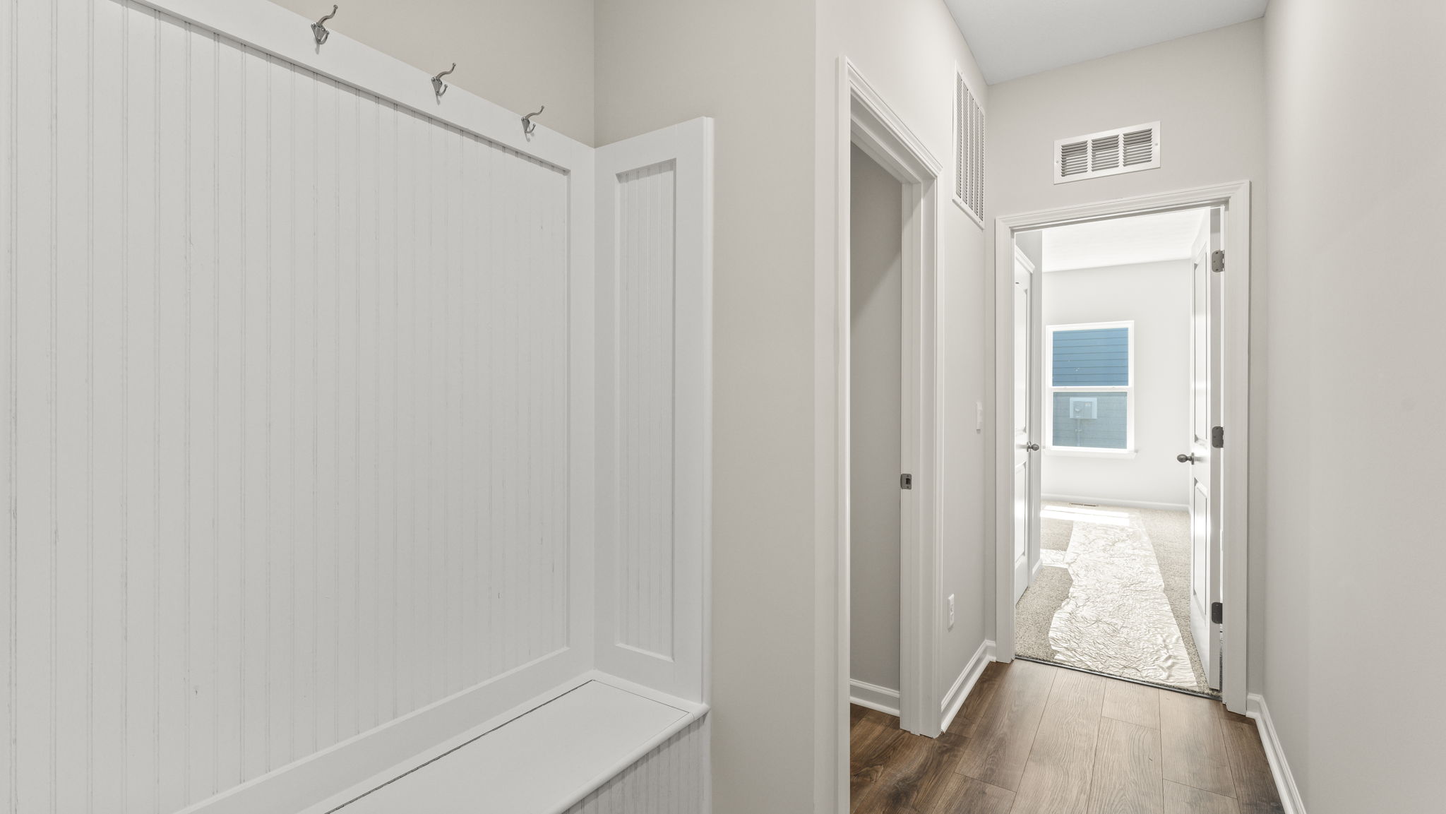 Closeup of mud room storage area.