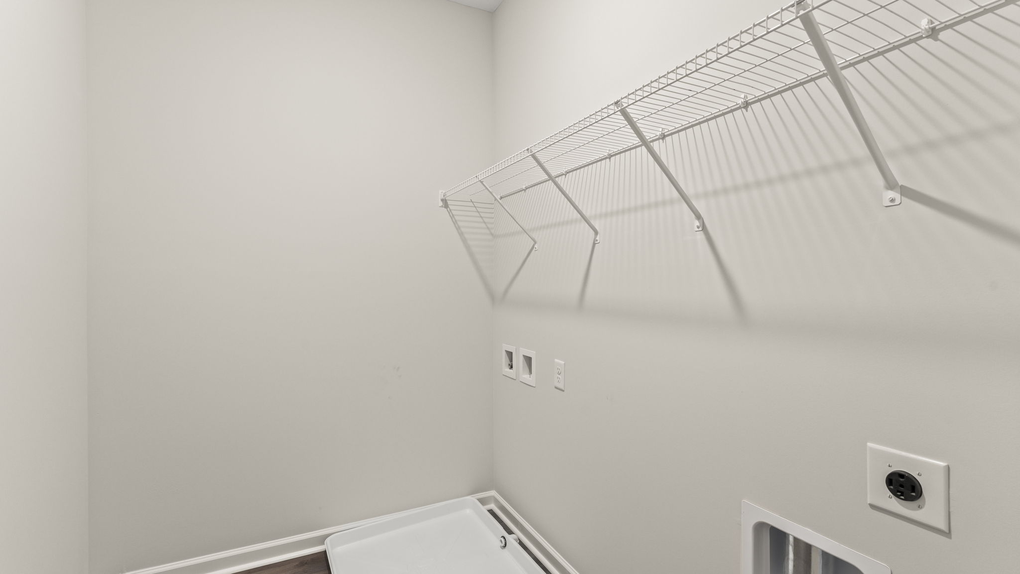 Closeup of laundry room wire rack shelving