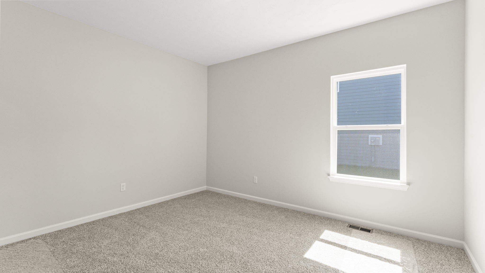 Carpeted bedroom with