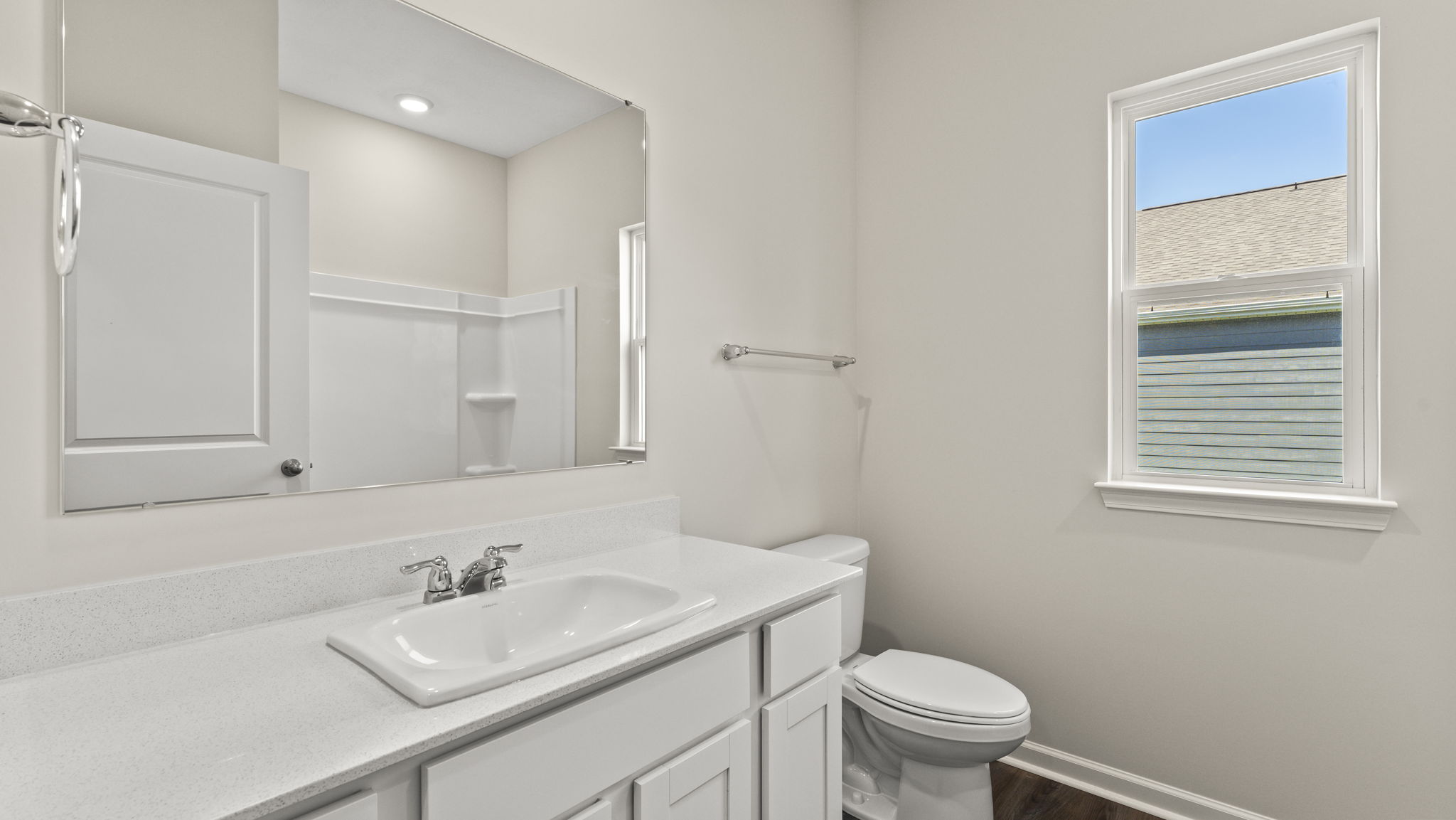 Bathroom with mirror and toilet
