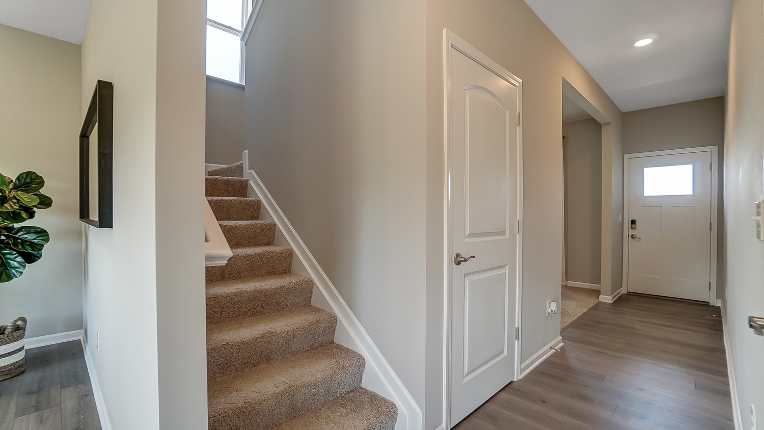 Hallway leading from great room to foyer.