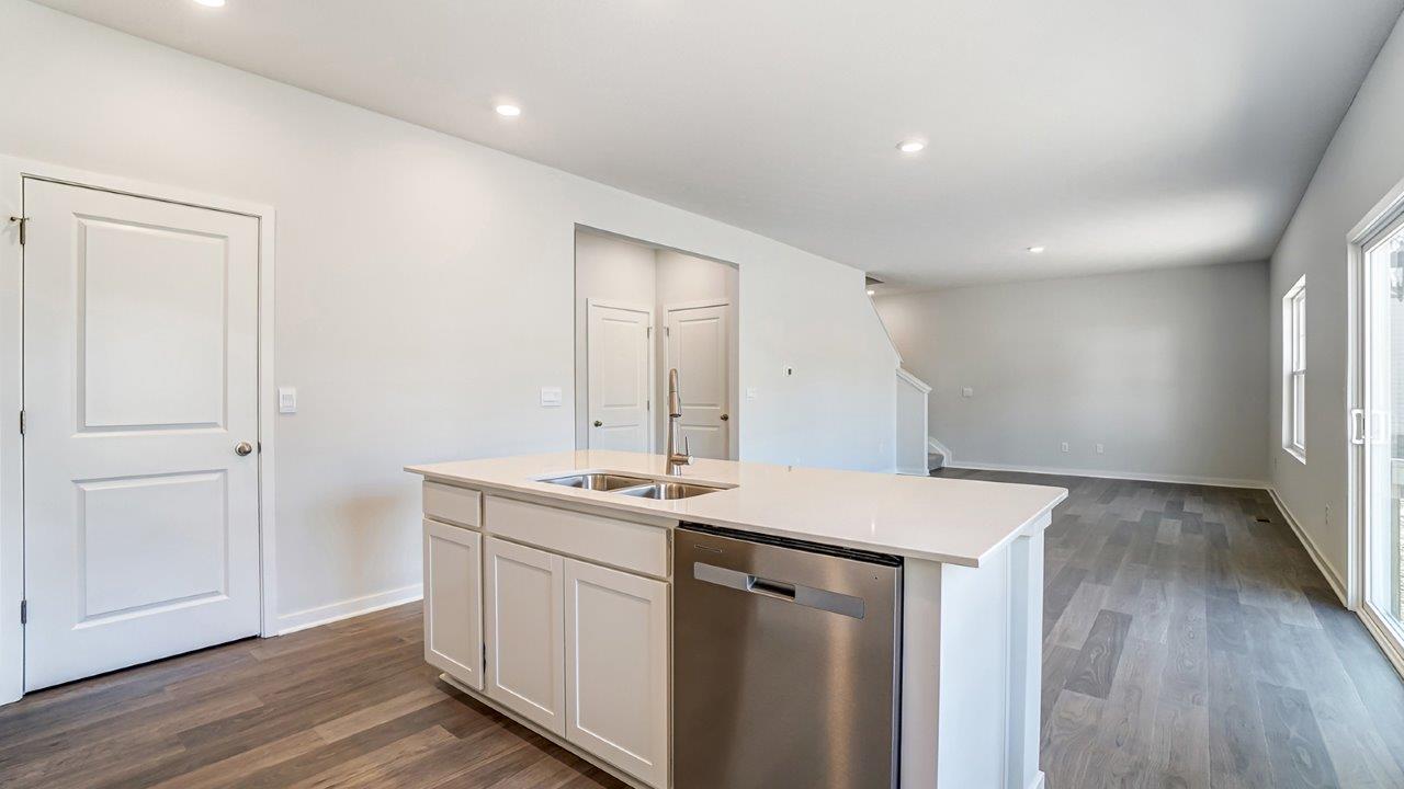 Interior kitchen with center island open to living area