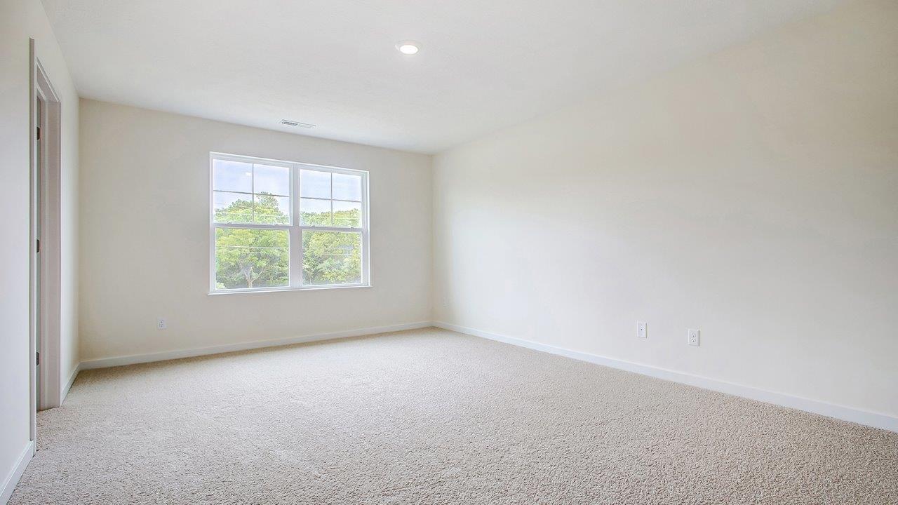 primary bedroom with double window