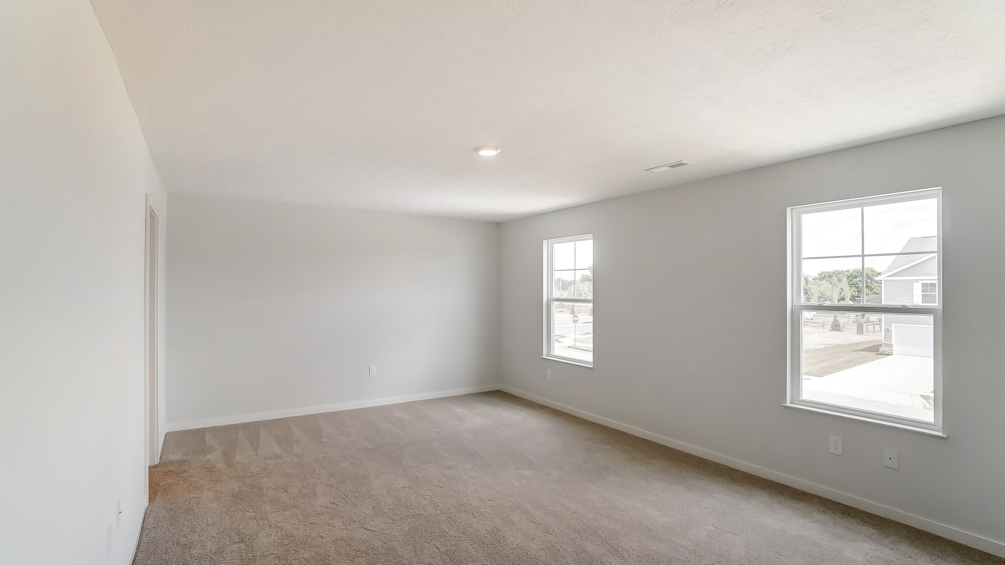 primary bedroom with single windows