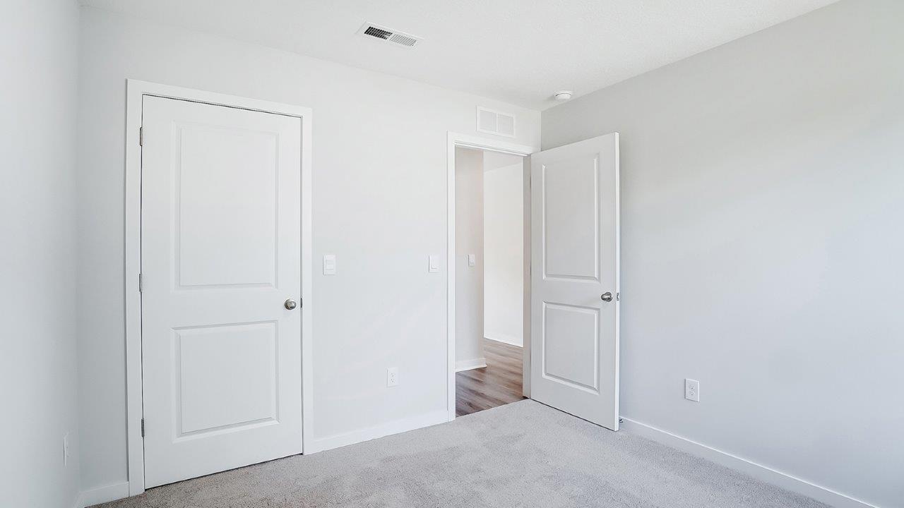 third bedroom closet and entry