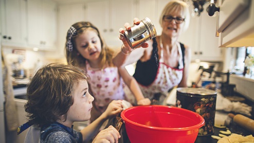 grandmother and grandchildren baking lifestyle photo