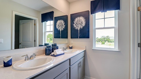 third full bathroom double vanity and single window