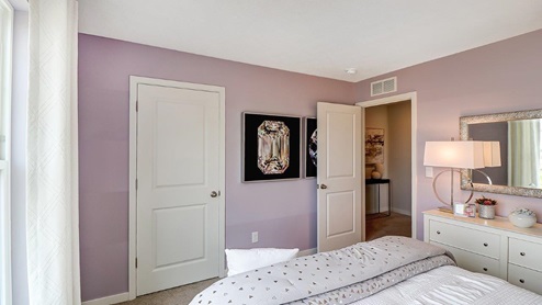 fourth bedroom with closet and entry