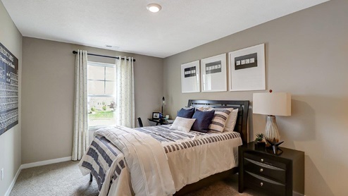 third bedroom with queen bed, nightstands and single window