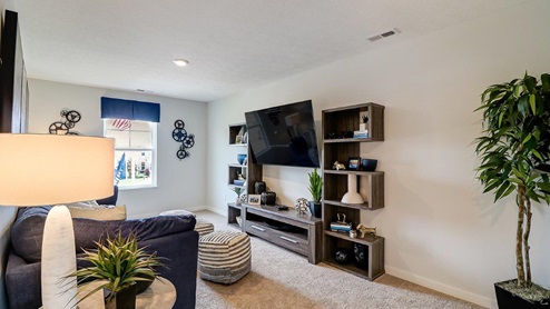 furnished flex loft space with media console