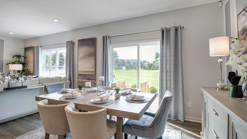 dining table and chairs, rear sliding door