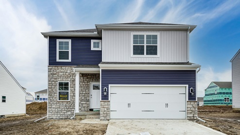 2 story home with grey and blue siding