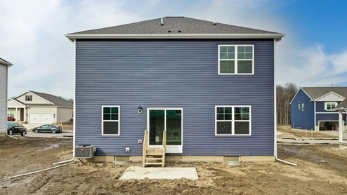 2 story home with blue siding exterior